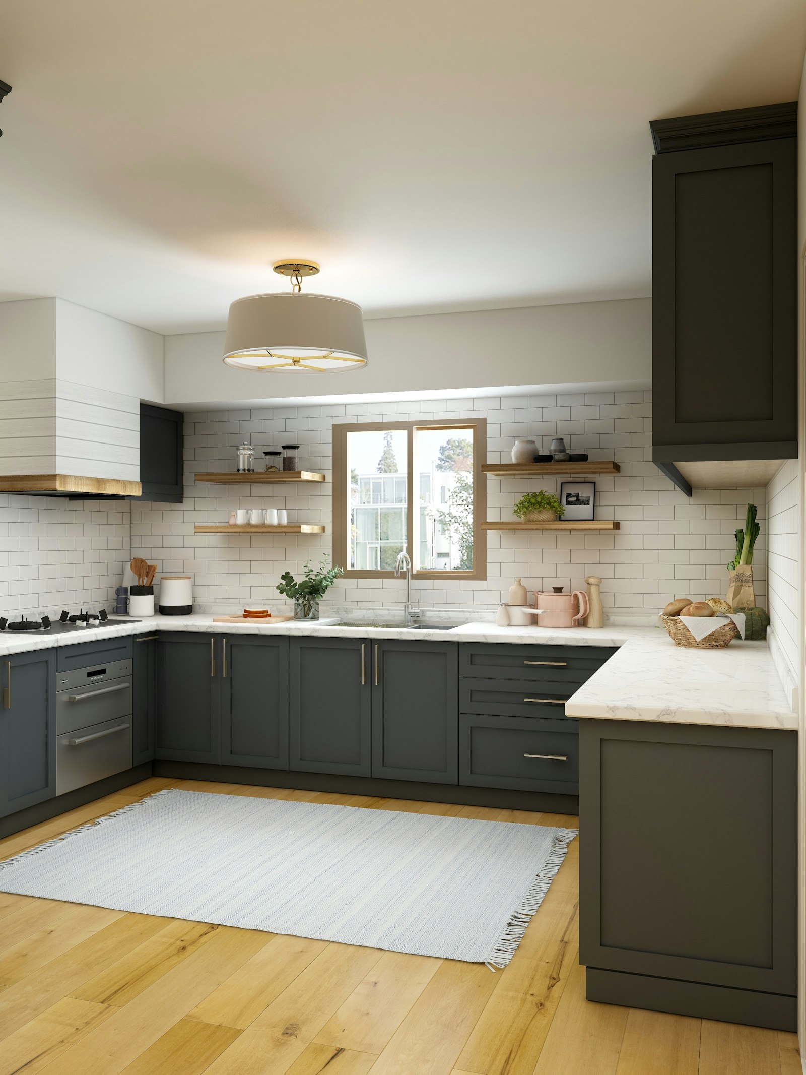 A kitchen island in oak beside pale cabinetry.